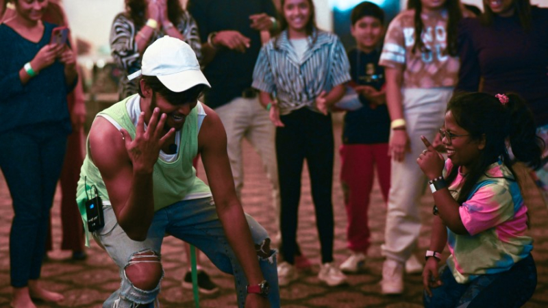 melvin dancing with students