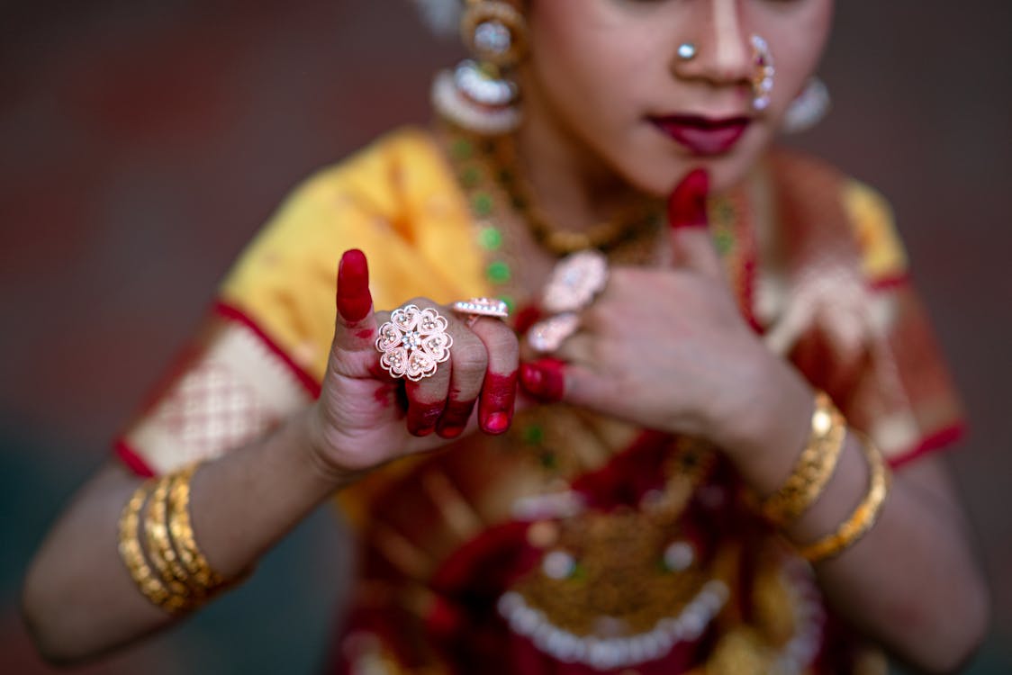 Classical dancer's hands with traditional jewellery — mudra practice