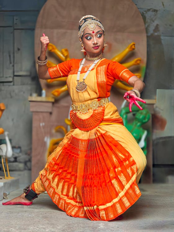 Odissi dancer in a studio class setting — practising traditional Bharatanatyam