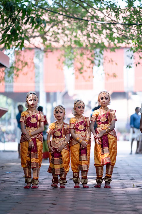 Young classical dancers in traditional Kerala attire — students in class